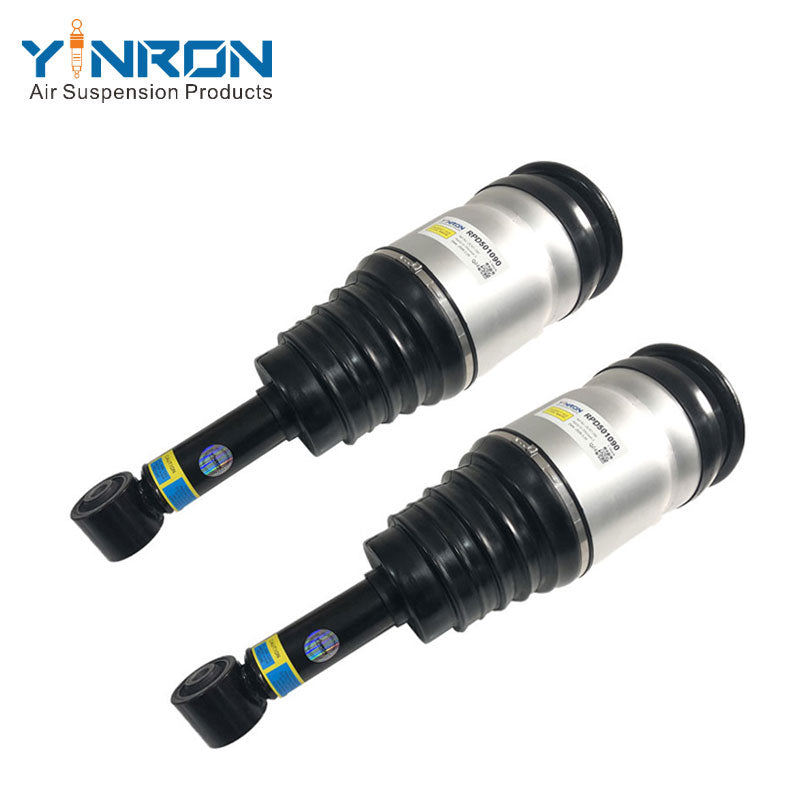 45-degree view of paired rear air suspension struts for Land Rover Discovery 3 / Range Rover Sport L320 (non-VDS), part number RPD501090 set