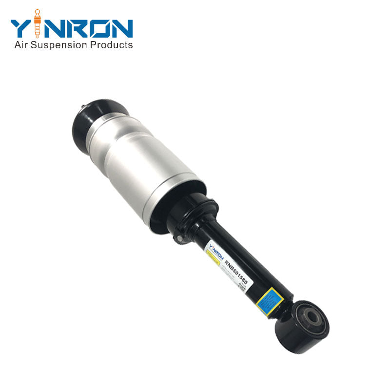 Close-up detail view of Land Rover Discovery 3 / Range Rover Sport L320 front air suspension strut (no VDS), showing part number marking and air connector, RNB501580