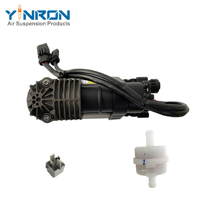 Detailed close-up view of air compressor pump for Volvo XC60 II, V90 Cross Country, S90L, V90, XC90 II, part number 32315091, showing relay, air filter, connectors, housing label and mounting points