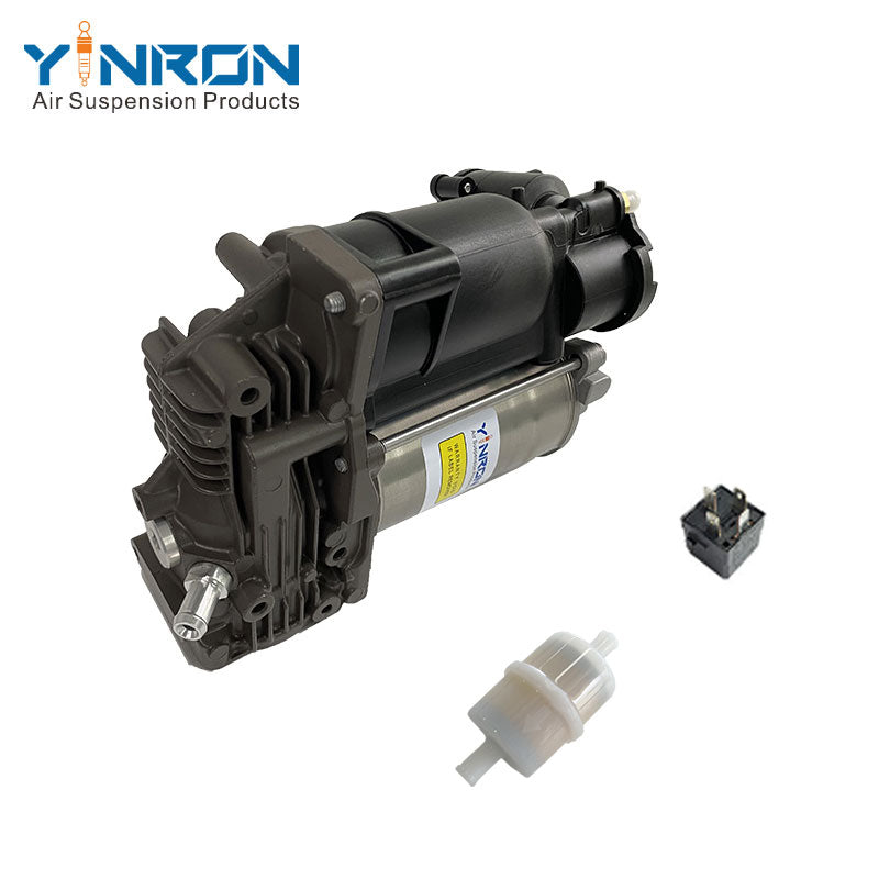 Close-up detail view of Jaguar XJ X351 air suspension compressor pump C2D5825 relay and air filter assembly