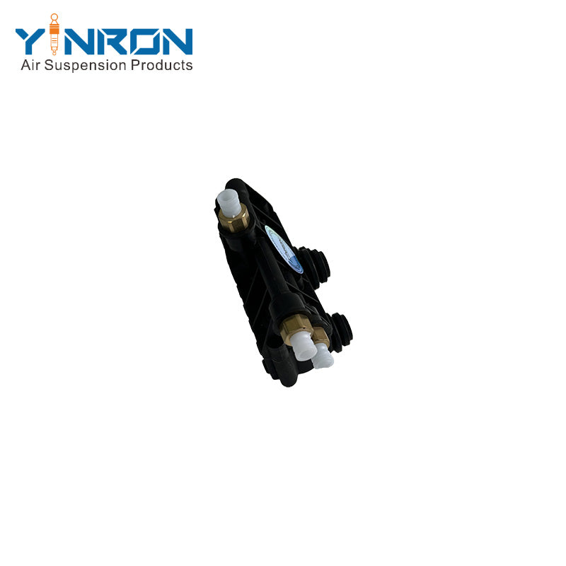 Detail view of Land Rover Range Rover Sport Discovery 3 Discovery 4 rear air suspension valve block (RVH000055)
