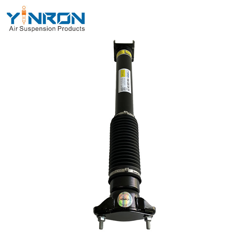 Close-up of OEM part number label A1643202431 on Mercedes rear air suspension strut.