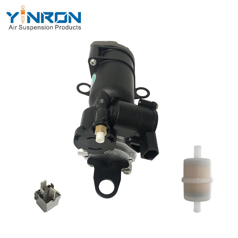 Top-down view of Mercedes‑Benz GLE C292 air suspension compressor pump with relay and air filter (A1663200104)