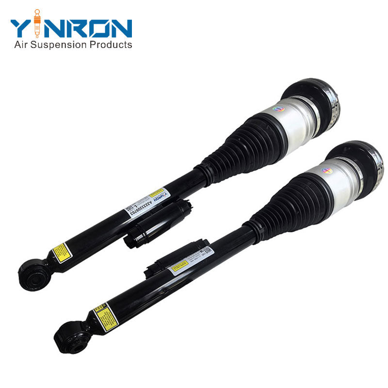Angled pair view of Mercedes S-Class W223 air suspension struts (A2233209703 & A2233209803)