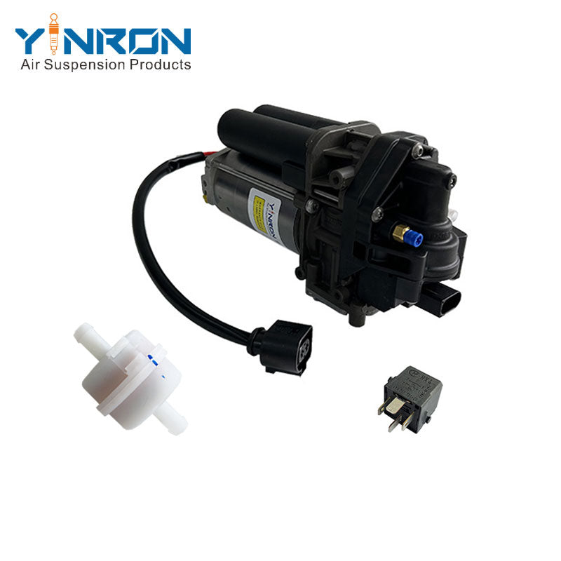 Rear left 45 degree overhead view for Porsche Cayenne III 9YA air suspension compressor pump with relay and air filter (95861600700 and 4M0616005F)