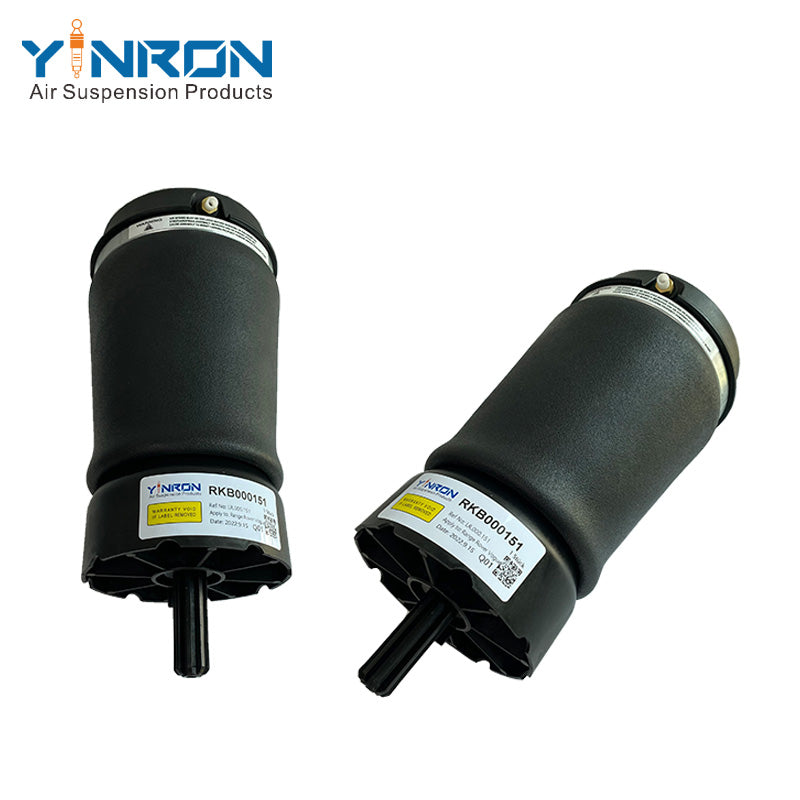 Pair view of Range Rover Vogue L322 rear air suspension springs (RKB000151)