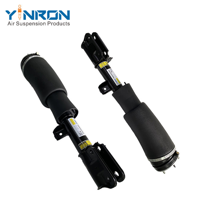 Side by side comparison of Range Rover L322 front air suspension struts (RNB000750G and RNB000740G)