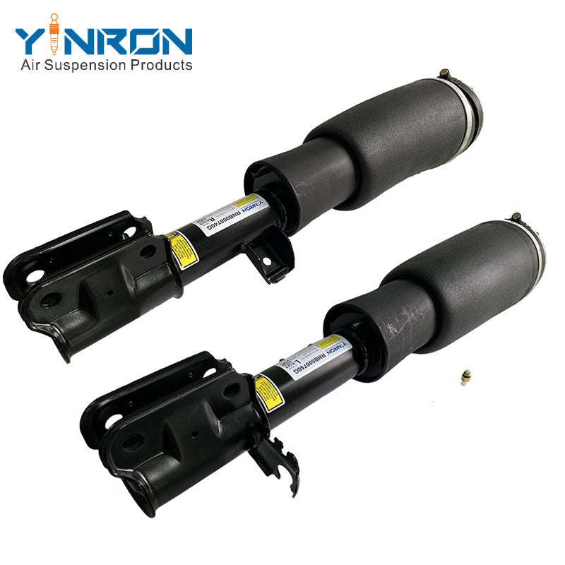 Side by side comparison of Range Rover L322 front air suspension struts (RNB000750G and RNB000740G)