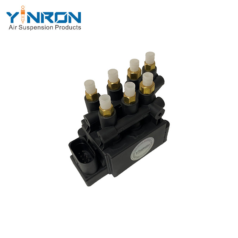 Side view of Tesla Model X 5YJX air suspension valve block (1027919-00-B)