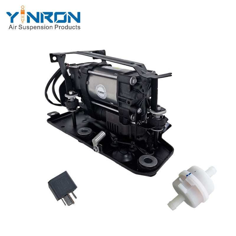 45 degree oblique angle shot of Volvo XC60 II XC90 II air compressor pump OE 31360720 32315091 with accessories