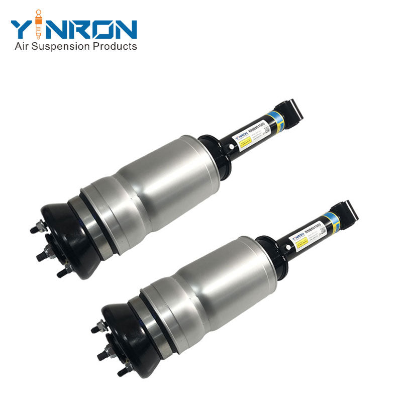Pair view of front left and right air suspension struts for Land Rover Discovery 3 / Range Rover Sport L320, without VDS, part number RNB501580 (both sides)