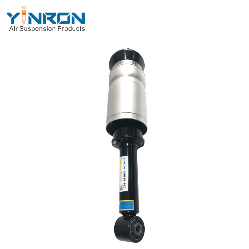Top-down vertical view of Land Rover Discovery 3 / Range Rover Sport L320 front air suspension strut (no VDS), showing top mount details, part number RNB501580
