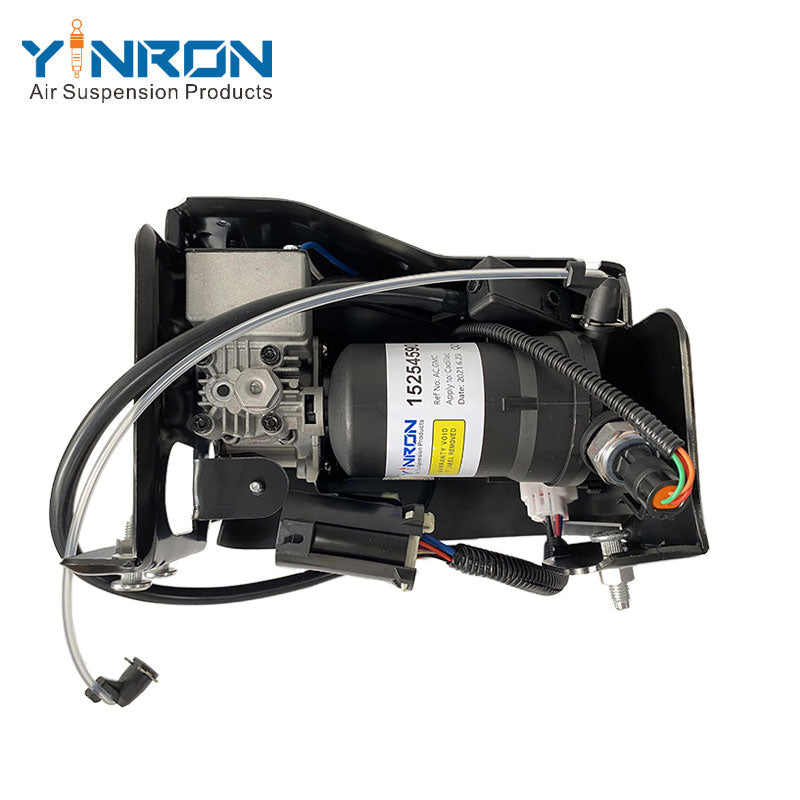 Top down vertical view of air suspension compressor pump for Cadillac Escalade II/III, Chevrolet Avalanche and GMC Yukon, OE 15254590, showing motor housing and mounting points