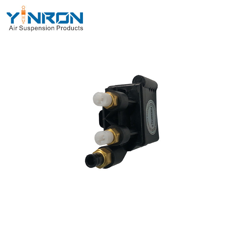 Detailed close-up view of BMW 6 Series G32 air suspension valve block (37206886721)