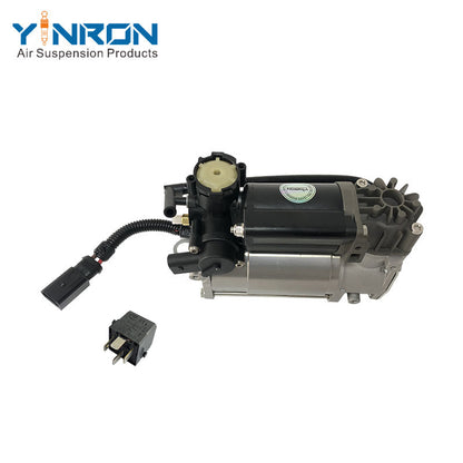 45-degree angled view of Jaguar XJ X350 air suspension compressor pump C2C27702 with relay