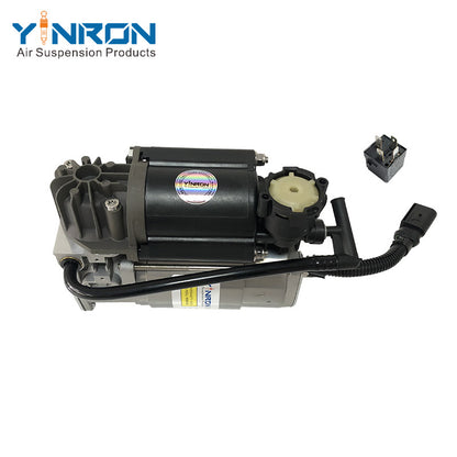 Close-up detail view of Jaguar XJ X350 air suspension compressor pump C2C27702 with relay
