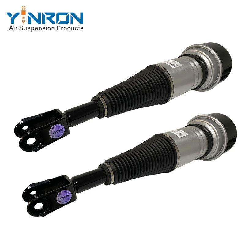 Side-by-side pair view of Jaguar XJ X350/X358 front air suspension struts with CVD (C2C41349)