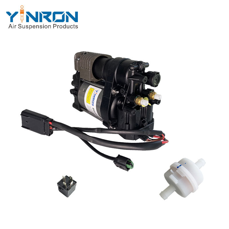 Side profile view of Jeep Grand Cherokee air suspension compressor pump part number 68232648AA