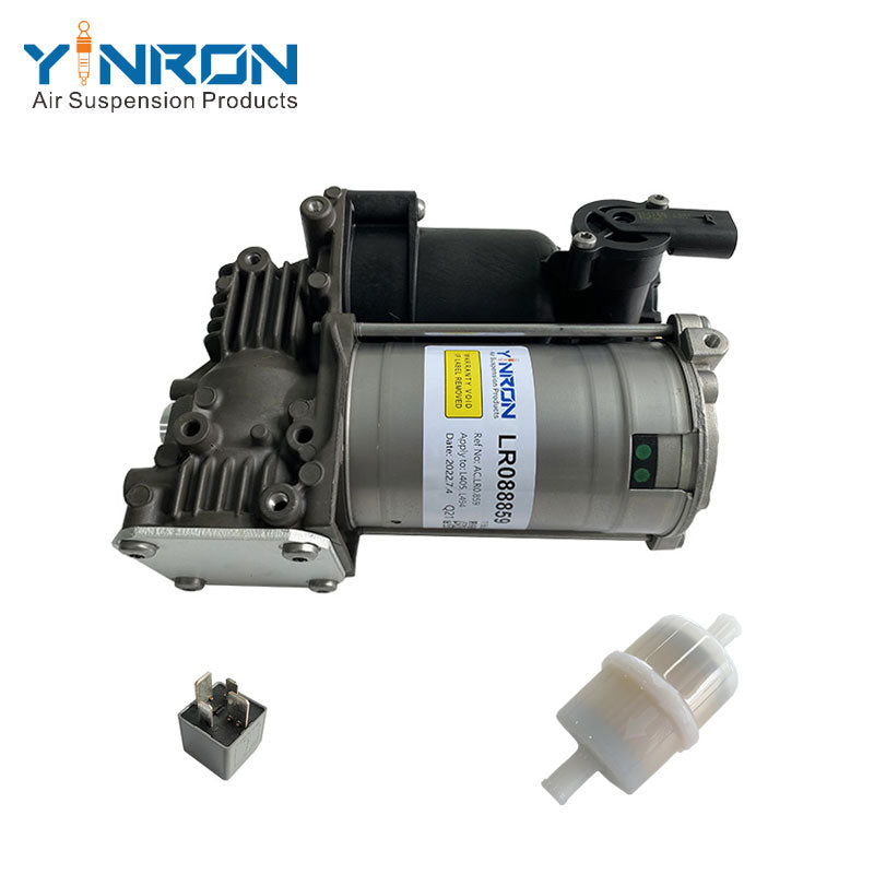 Close-up detail shot of Land Rover L405 L494 air suspension compressor pump LR088859 relay and air filter assembly