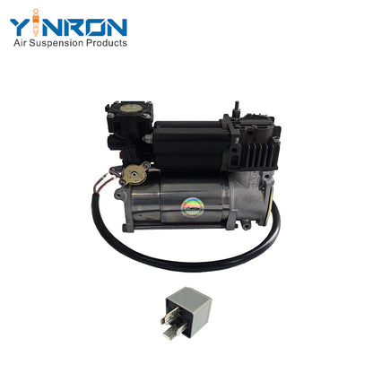 Close-up detail view of Land Rover Range Rover L322 air suspension compressor pump RQL000014 with WABCO relay