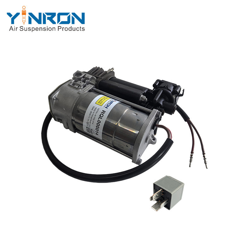 Full eye-level front view of Land Rover Range Rover L322 air suspension compressor pump RQL000014 with WABCO relay