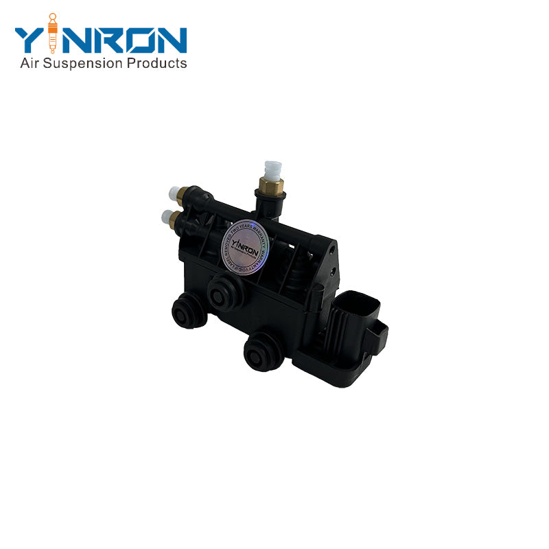 Detail view of Land Rover Range Rover Sport Discovery 3 Discovery 4 front air suspension valve block (RVH000095)