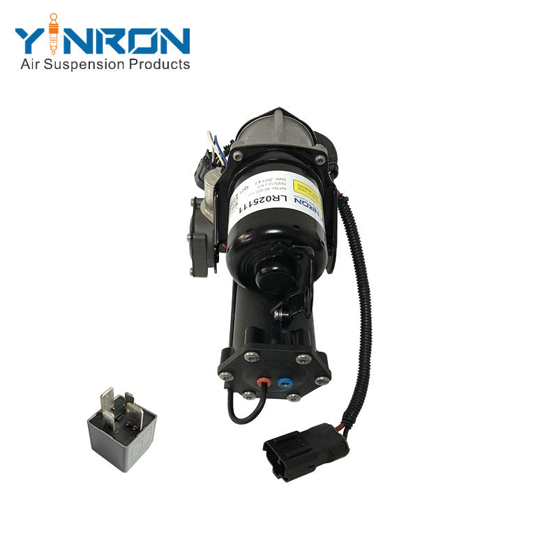 Eye-level full view of Land Rover Range Rover Vogue L322 air suspension compressor pump LR025111 equipped with Hitachi relay