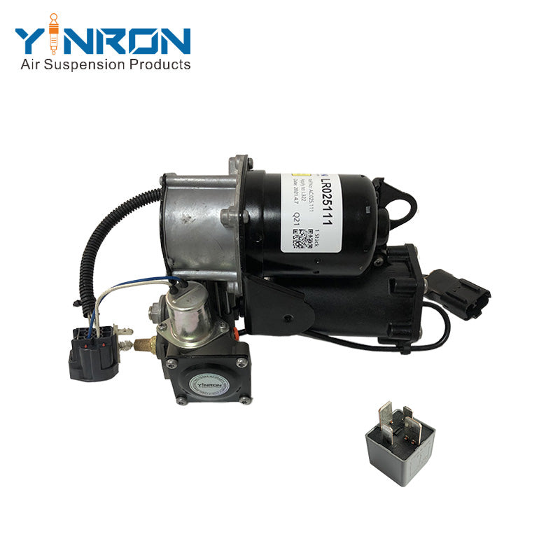 Top down vertical view of Land Rover Range Rover Vogue L322 air suspension compressor pump LR025111 with Hitachi relay