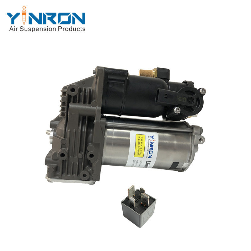 Eye-level front view of Land Rover Range Rover Vogue L322 air suspension compressor pump LR041777 with relay