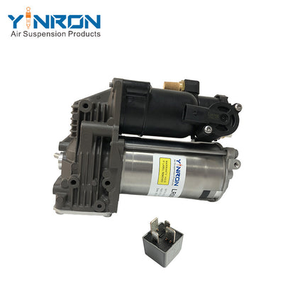 Eye-level front view of Land Rover Range Rover Vogue L322 air suspension compressor pump LR041777 with relay