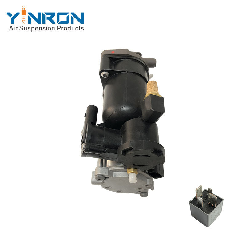 Top down vertical view of Land Rover Range Rover Vogue L322 air suspension compressor pump LR041777 equipped with relay