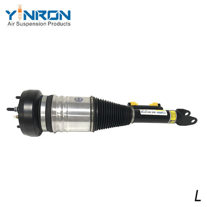 Close-up of OEM label with part number A2053204768 on Mercedes W205 air suspension strut.