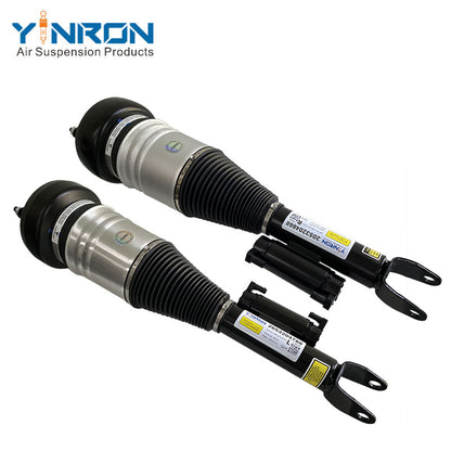 A set of front left and front right air suspension struts for Mercedes-Benz W205