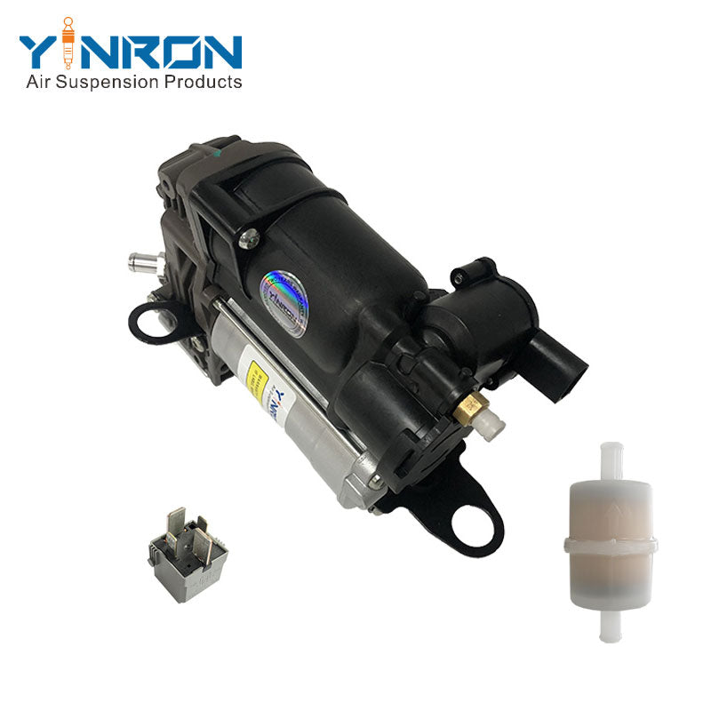 45‑degree view of Mercedes‑Benz GLE C292 air suspension compressor pump with relay and air filter (A1663200104)
