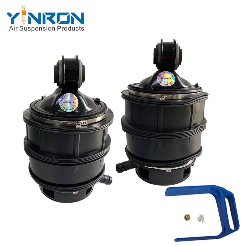 Pair view of Mercedes E-Class W211 4Matic rear air suspension springs (A2113200725 & A2113200825)