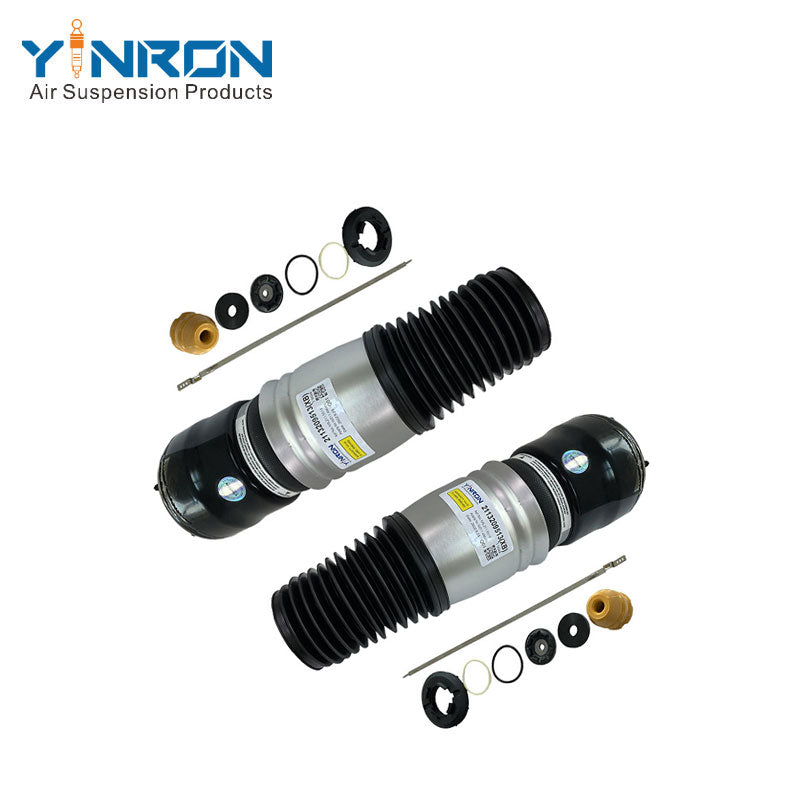 Front view of a pair of Mercedes W211 4Matic front air suspension springs (A2113209513, A2113209613)