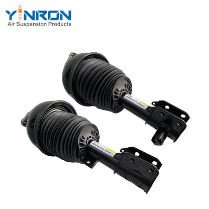 Full front view of a pair of Mercedes W212 4Matic front air suspension struts with ADS (A2123203338 / A2123203438)