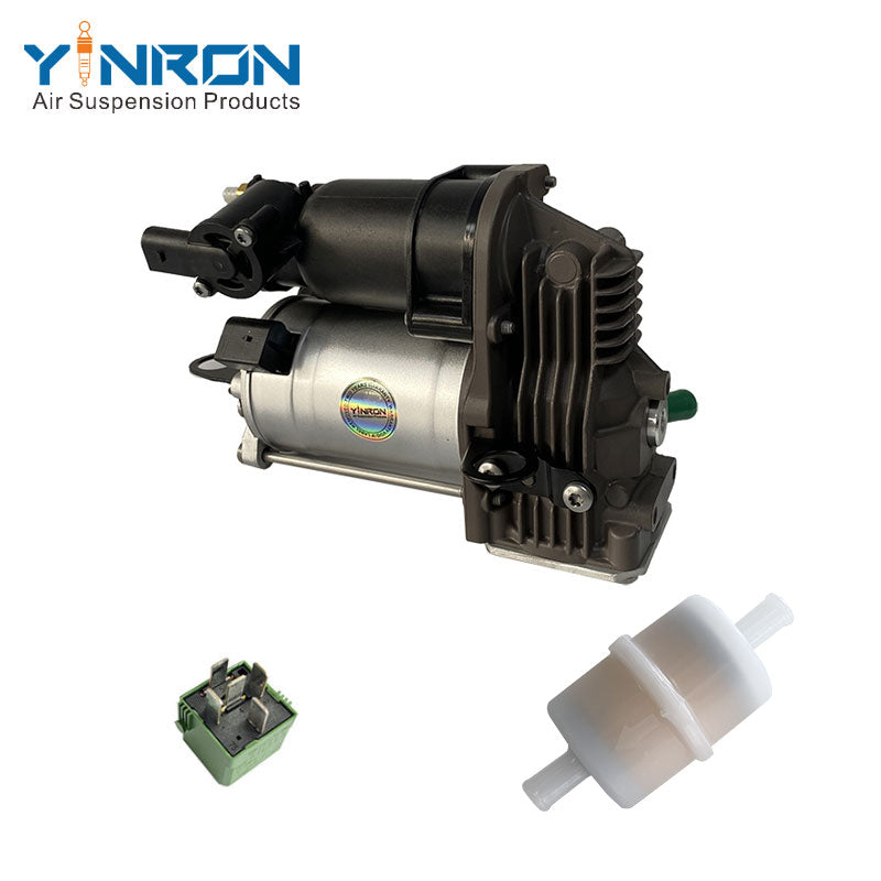 Side profile view of Mercedes-Benz W221 C216 air ride compressor pump A2213200304 including relay and air filter