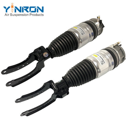 Angled perspective view of Porsche Cayenne 958 front air suspension strut pair (95835803916 & 95835804016)