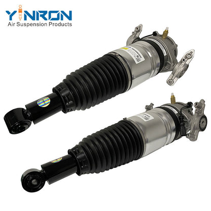 Angled perspective view of Porsche Cayenne 958 rear air suspension strut pair (95835801900 & 95835802000)