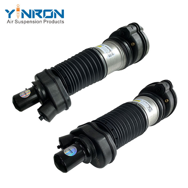 Full 45 degree view of paired Porsche Cayenne III 9YA front air suspension struts with PASM Active Damping (9Y0616039 & 9Y0616040B)