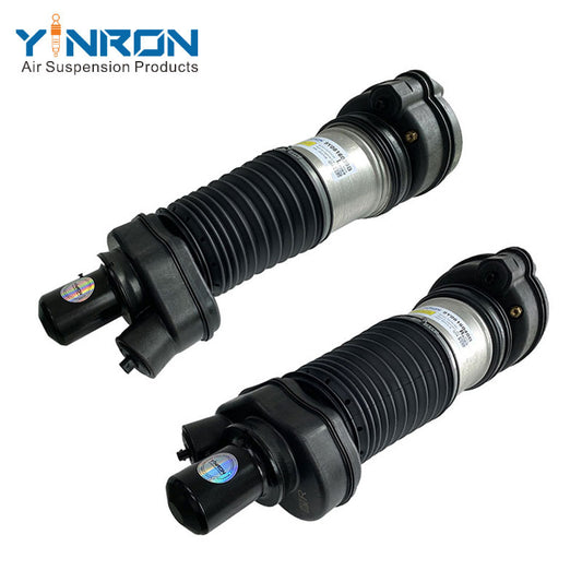 Full 45 degree view of paired Porsche Cayenne III 9YA front air suspension struts with PASM Active Damping (9Y0616039 & 9Y0616040B)