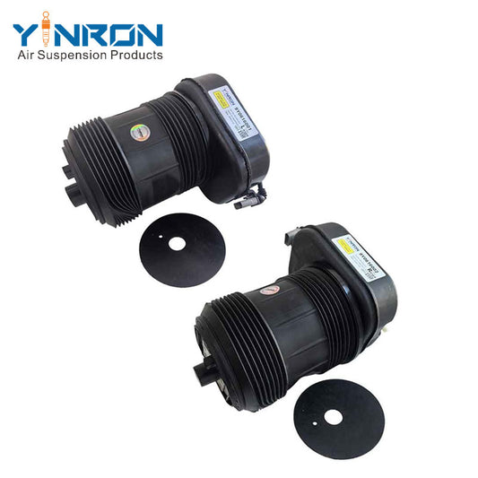 45-degree perspective view of Porsche Cayenne III 9YA rear air suspension spring pair (9Y0616001 & 9Y0616002)