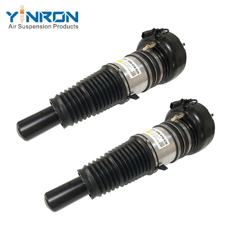 45 degree pair view of matching front left and right PASM air struts for Porsche Macan 95B 2014-2019 (95B616039 / 95B616040)
