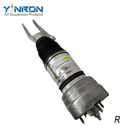 Close-up detail view of mounting bracket and air fitting on Porsche Panamera 970 front right PASM air suspension strut 97034305217