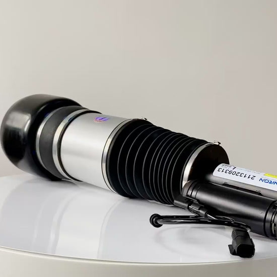 Close-up video demonstration of the premium rubber sleeve and solenoid valve on a Mercedes E-Class W211 air suspension strut.