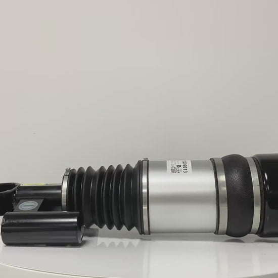 Close-up video demonstration of the premium rubber sleeve and solenoid valve on a Mercedes E-Class W211-4MATIC air suspension strut.