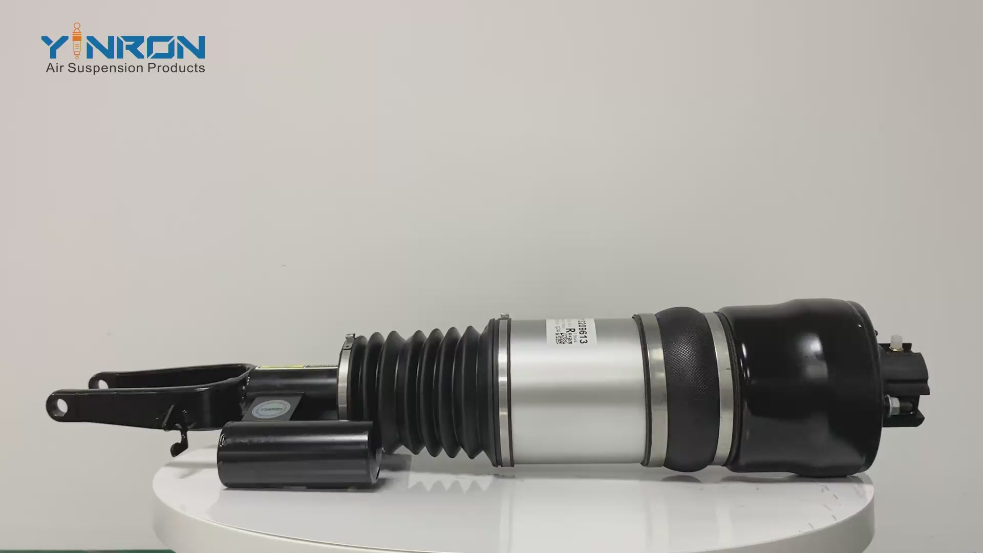 Close-up video demonstration of the premium rubber sleeve and solenoid valve on a Mercedes E-Class W211-4MATIC air suspension strut.