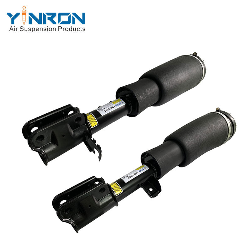 Full 45 degree pair view of Range Rover Vogue L322 front electric air suspension strut (LR012885 & LR012859)