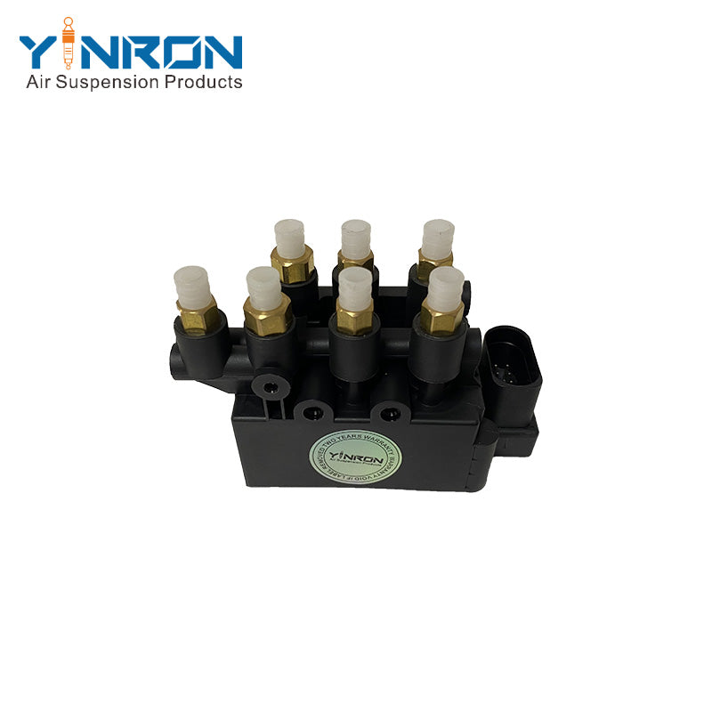Eye-level view of Tesla Model S 5YJS air suspension valve block (1027919-00-B)